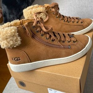 Brand new, never been worn, zip up Ugg sneakers